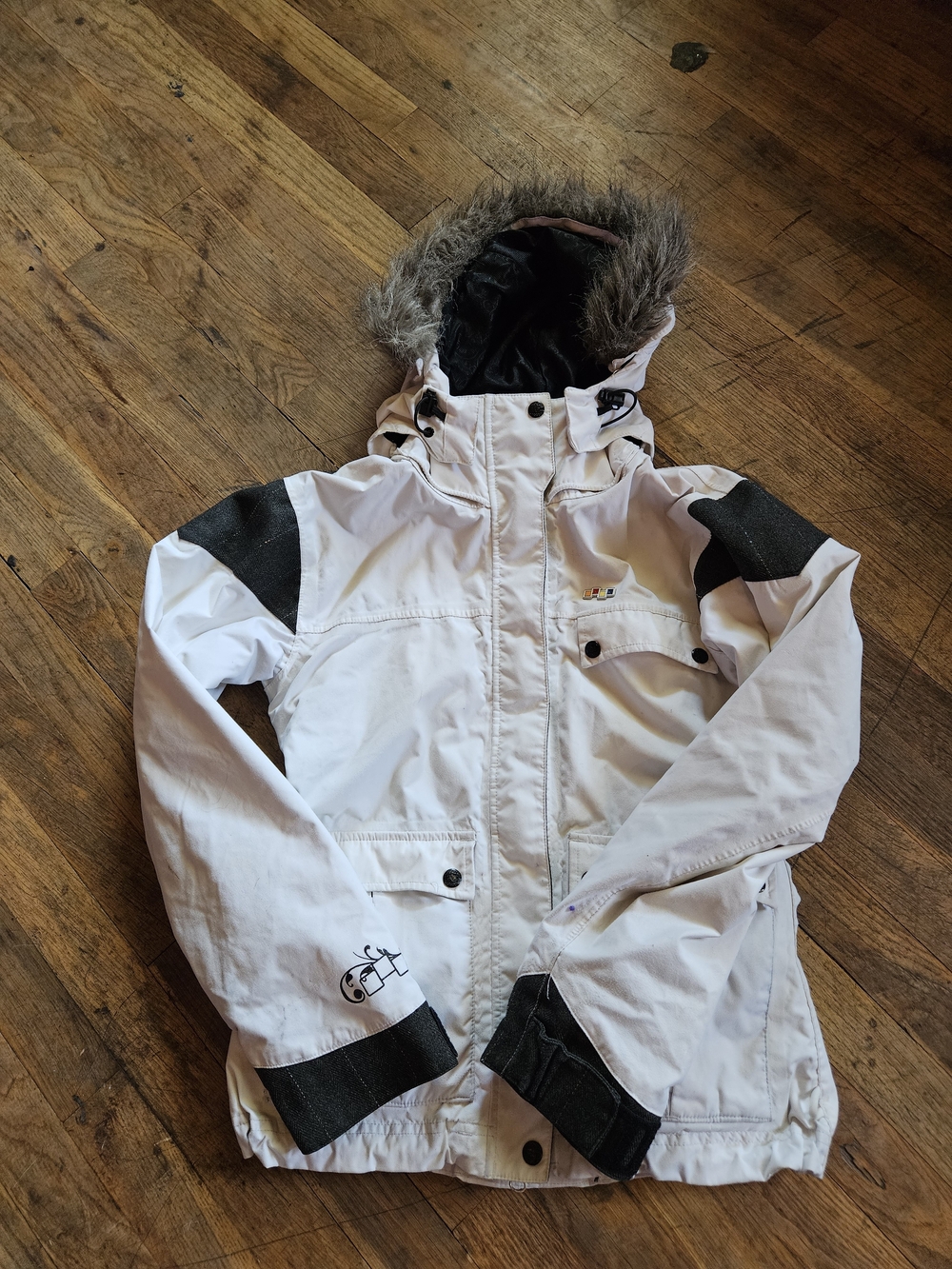 Women’s White Ski Jacket with Faux-Fur Hood and Black Accents